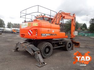 1966095621 kolesnyj ekskavator doosan